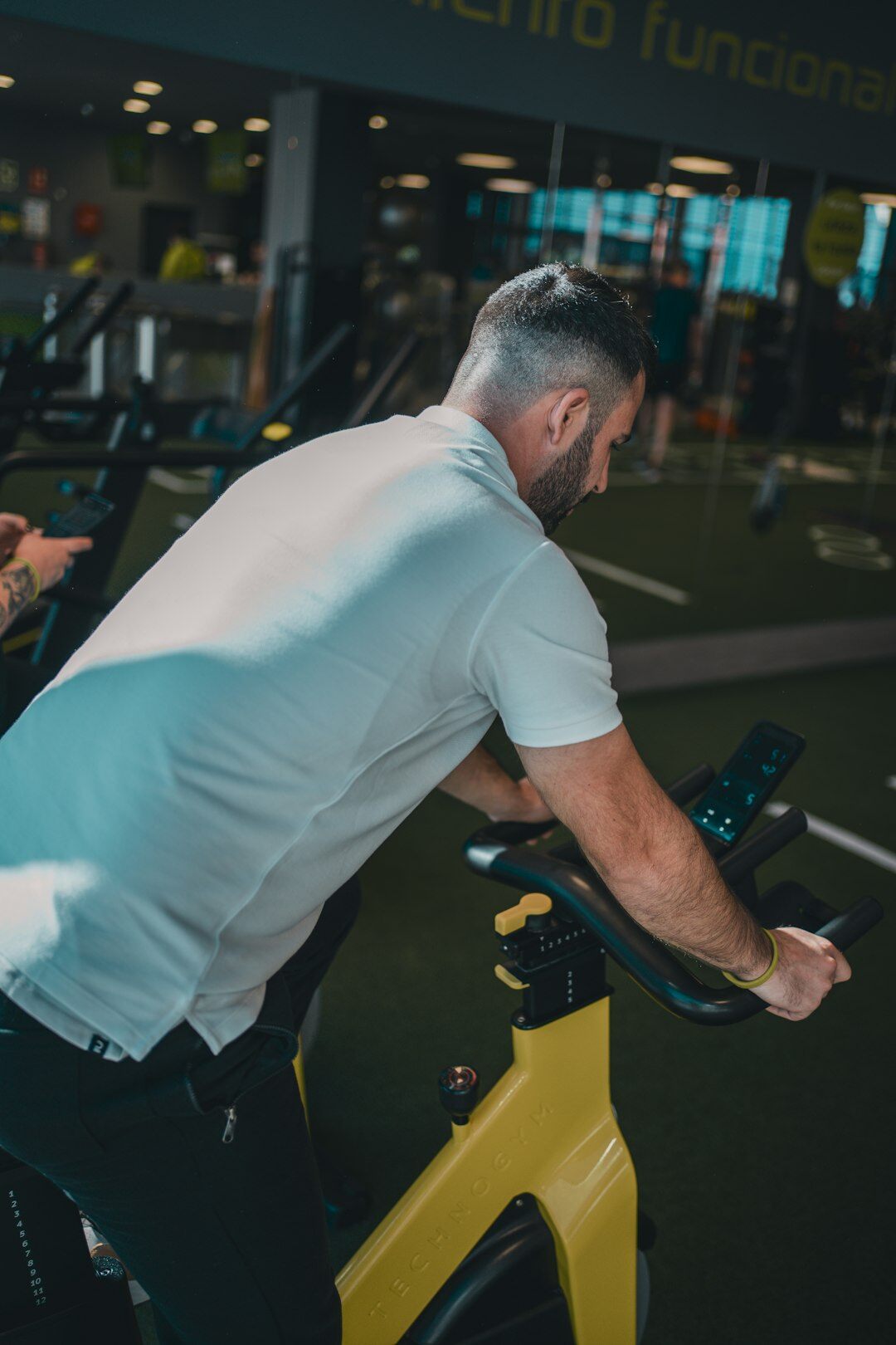 elderly people exercising in gym