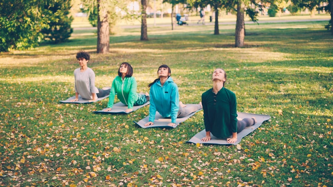seniors meditating in park