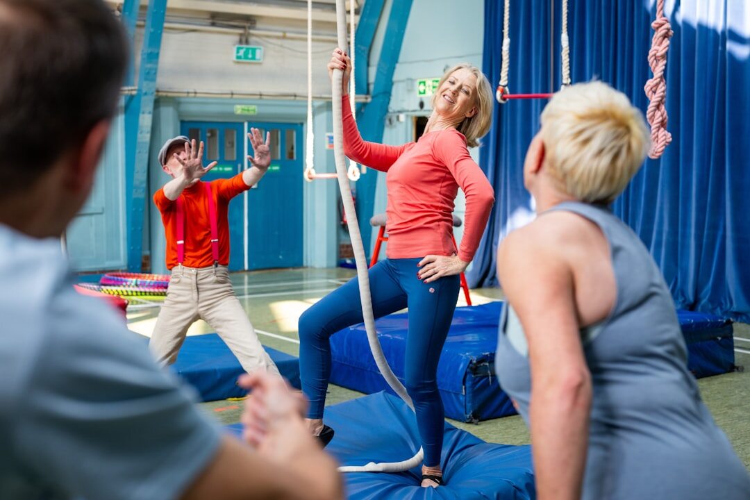 elderly people exercising in gym