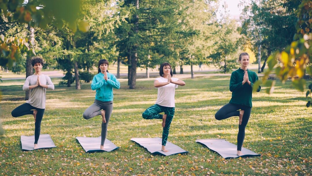 senior yoga class outdoors